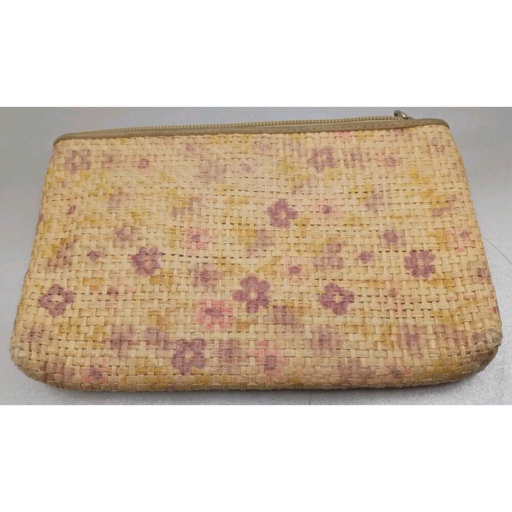 woven yellow and purple floral clutch or zipper pouch with a side zipper